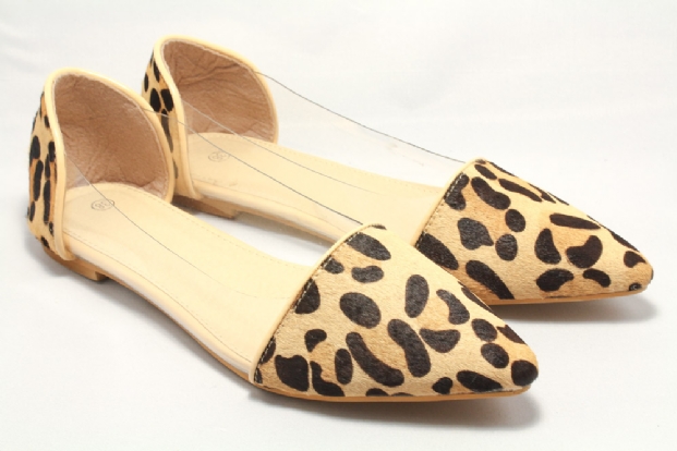 Leopard print 'pony hair' flats with transparent inserts.
