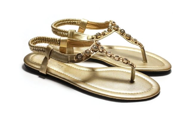 Gold T- Bar sandal with gold and diamond trim.
