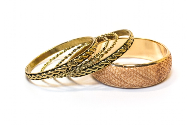 Gold and tan snake-skin pattern bangle set.